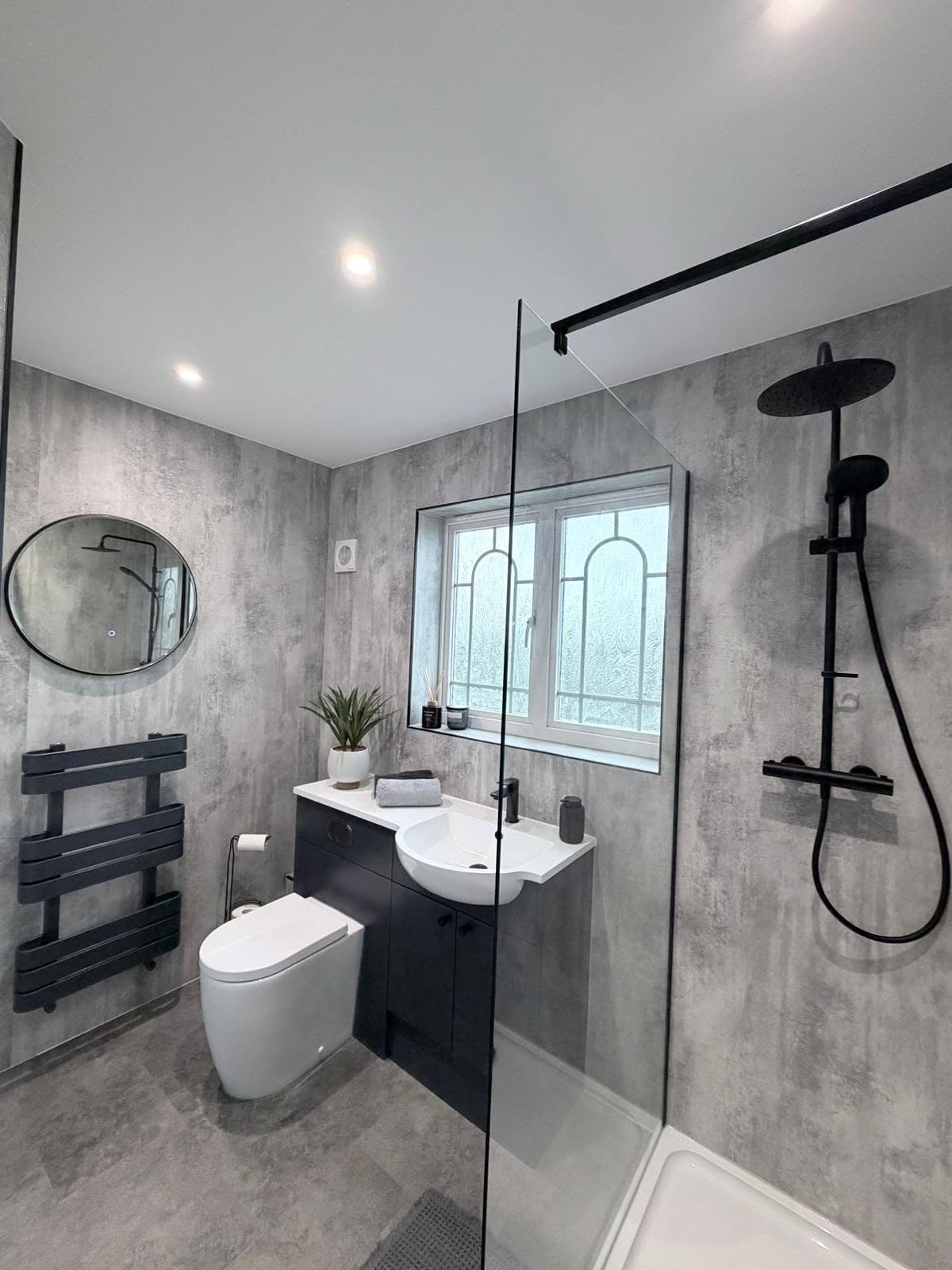 Space-efficient modern bathroom refurbishment in Derbyshire with practical contemporary features