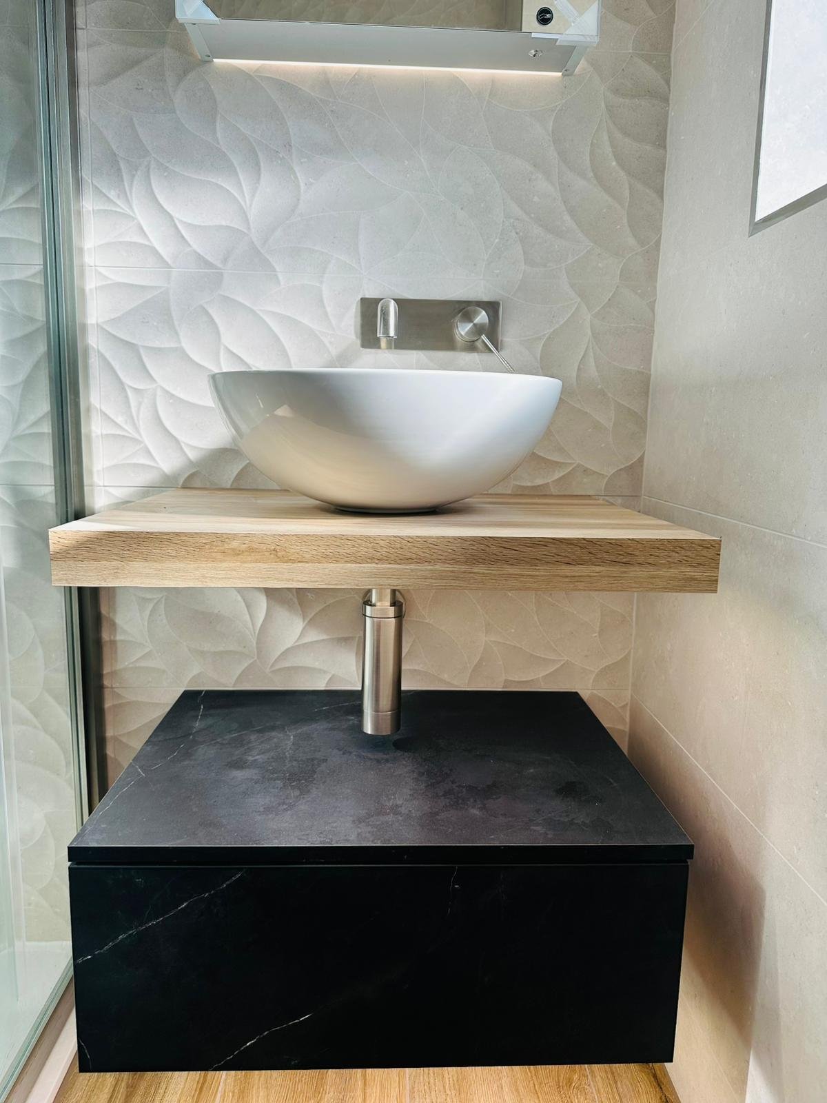 Moisture-resistant vanity area with natural-look surfaces in a Derbyshire bathroom