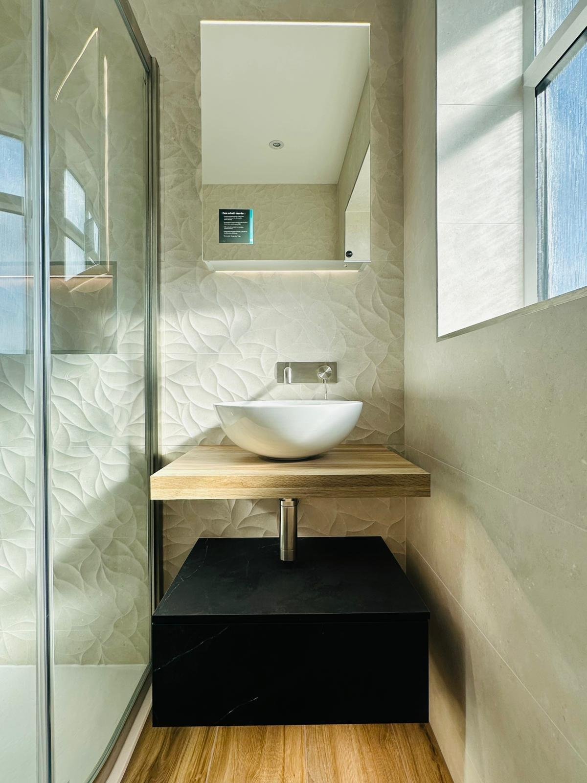 Warm botanical bathroom palette with layered green and earth tones in Derbyshire